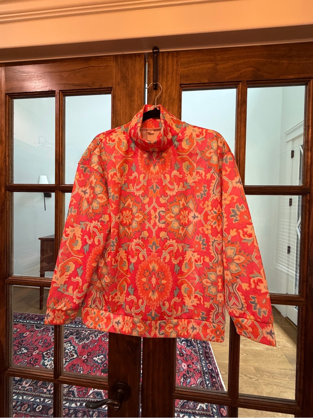 Vibrant Orange Floral Turtleneck Sweatshirt
